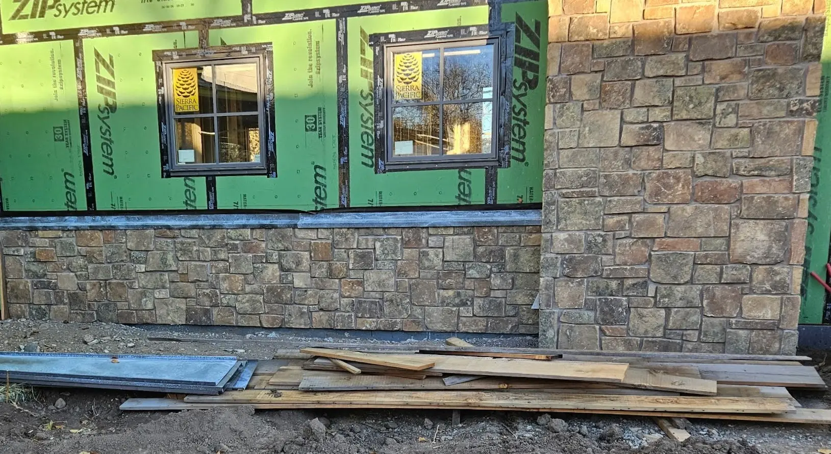 Spreewald Natural Thin Stone Veneer Chimney and Wainscoting Installation Close Up