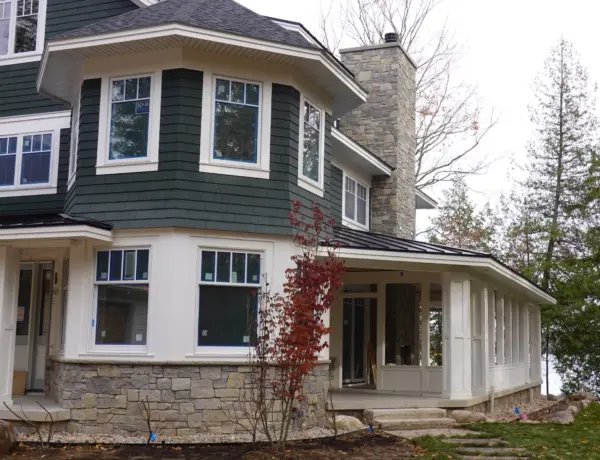 Stillwater Real Thin Stone Veneer Wainscoting and Chimney Installation