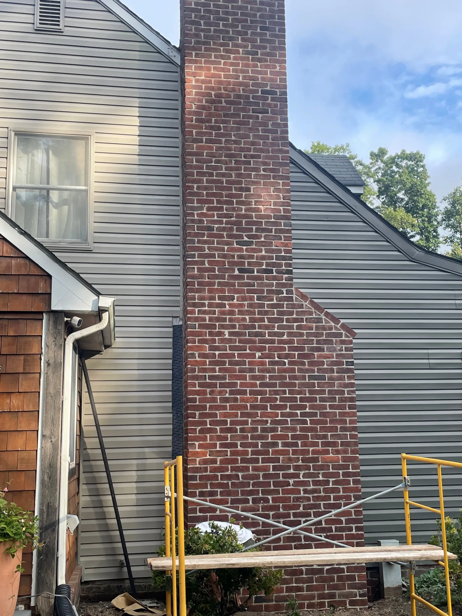Lisbon Real Thin Stone Veneer Brick Chimney Renovation