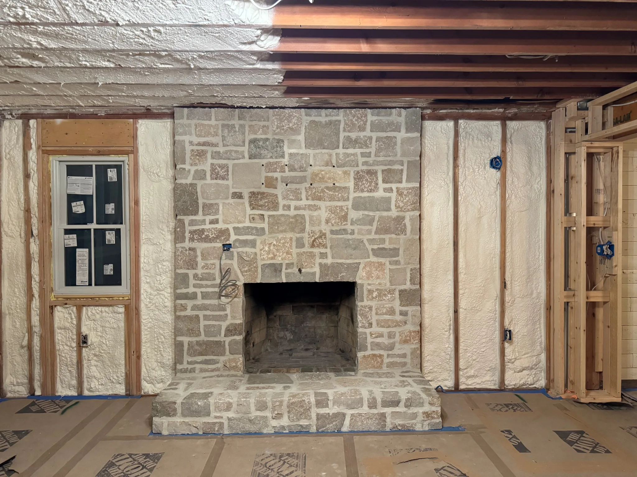 Lisbon Real Thin Stone Veneer Interior Fireplace Installation in Progress