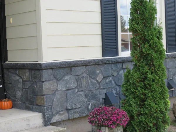 Carn Brea Natural Stone Veneer Wainscoting Close Up with Black Mortar