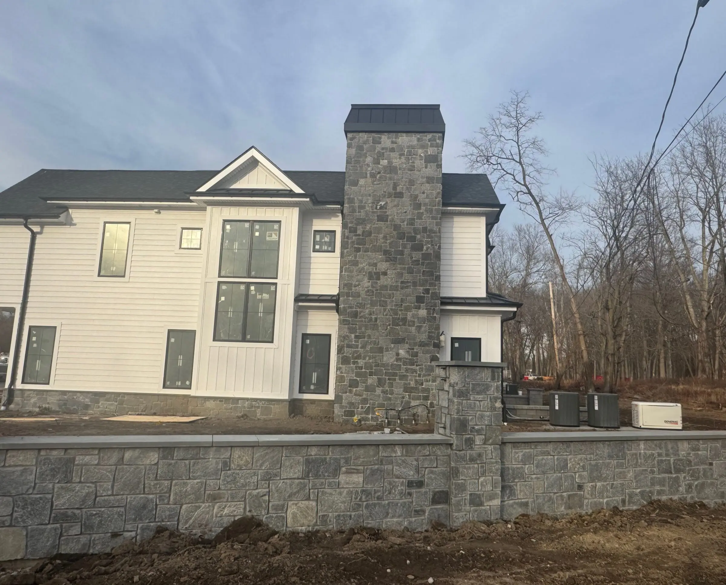 Rubislaw Real Thin Stone Veneer Exterior and Landscaping Installation